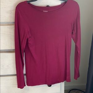 Long sleeve magenta shirt.